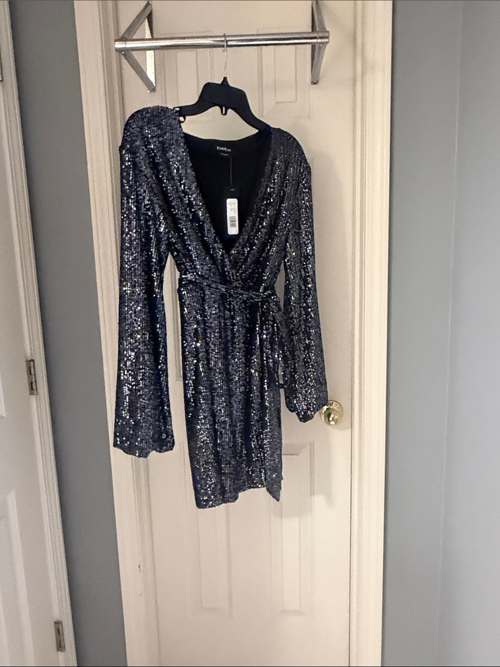 Brand new Bebe Sequin Wrap Mini Dress